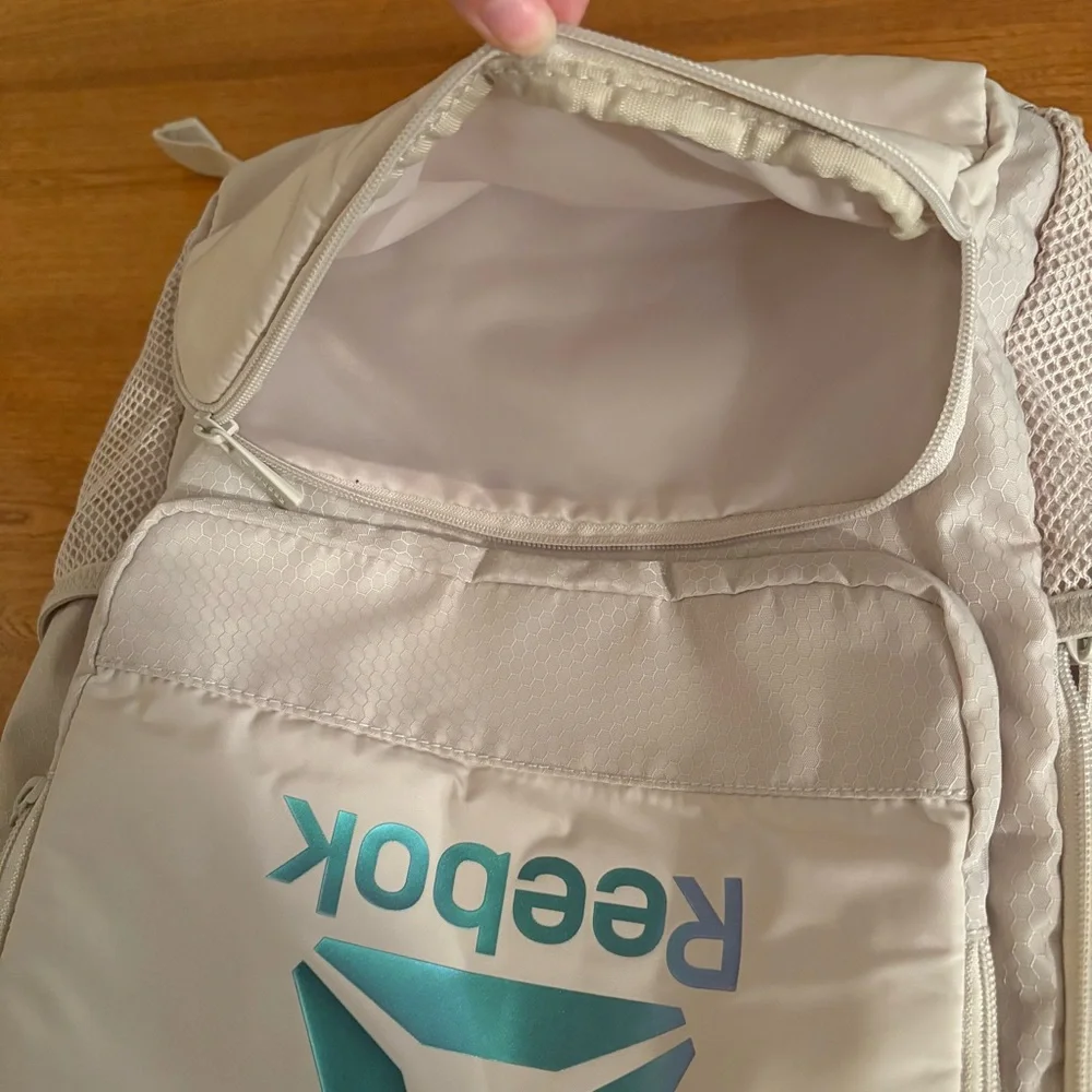 Reebok Adult Laptop Paige Backpack Iridescent Logo, Pumice Stone, Tan Cream Zip